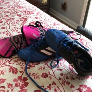 Youth soccer cleats & shin guards.
